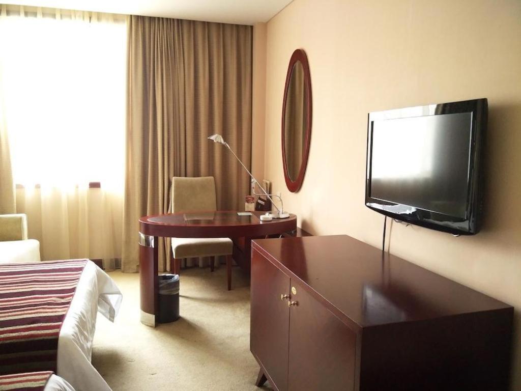 Maison New Century Hotel Ningbo Exterior foto